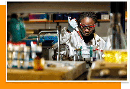 a black woman working in a medical lab
